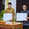 Disaksikan Menteri ATR/BPN, Gubernur Mirza Bersama Kepala BPN Tandatangani NPHD.