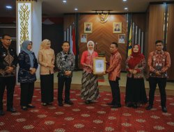 Prosesi Pelepasan Purnabakti Kepala Dinas Perkebunan Provinsi Lampung Berlangsung Khidmat