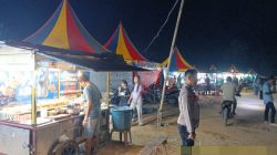 Ciptakan Kamtibmas Kondusif, Polsek Rebang Tangkas Gelar Patroli di Pasar Malam